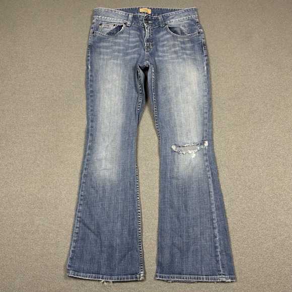 Buckle Denim - Worn-In Blue Flare Jeans - Women's Distressed Denim